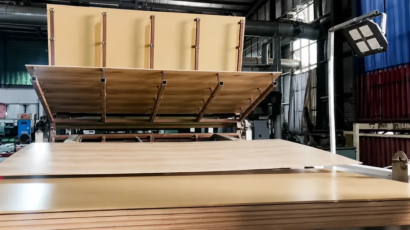 Laminate flooring panels during industrial production and pressing